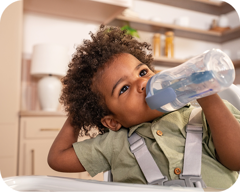 Child drinking from cup