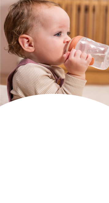Baby with Learner Bottle