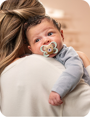 Baby with soother