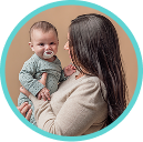 Mother with baby and soother